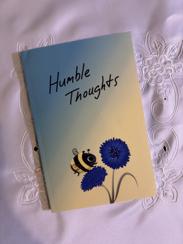 Notebook cover with the words ""Humble Thoughts" above a cartoon bee on a flower.